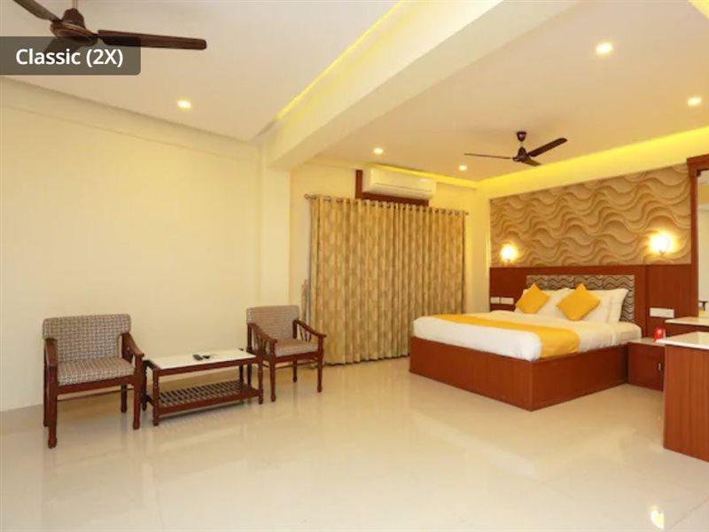 Capital O Kovilakam Residency Thrissur Экстерьер фото
