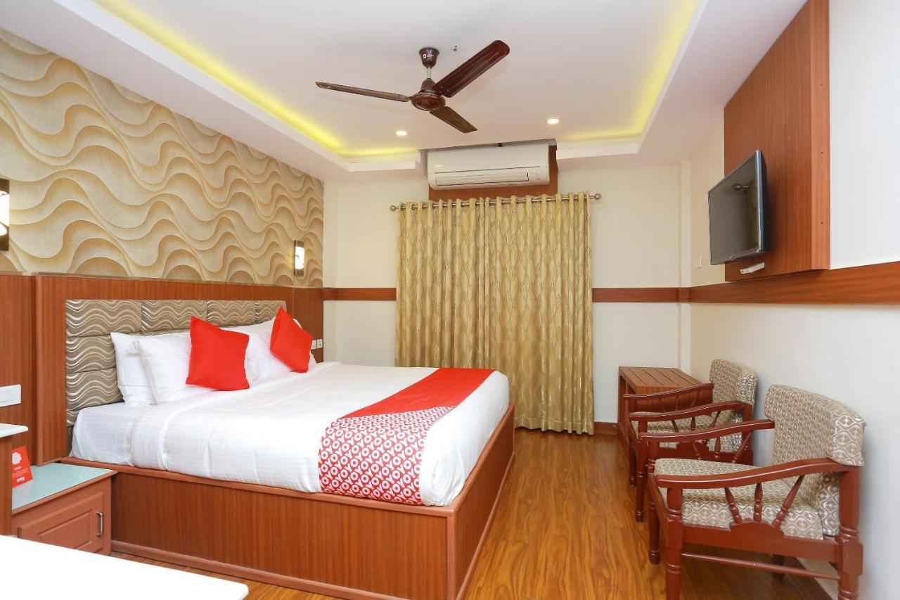 Capital O Kovilakam Residency Thrissur Экстерьер фото