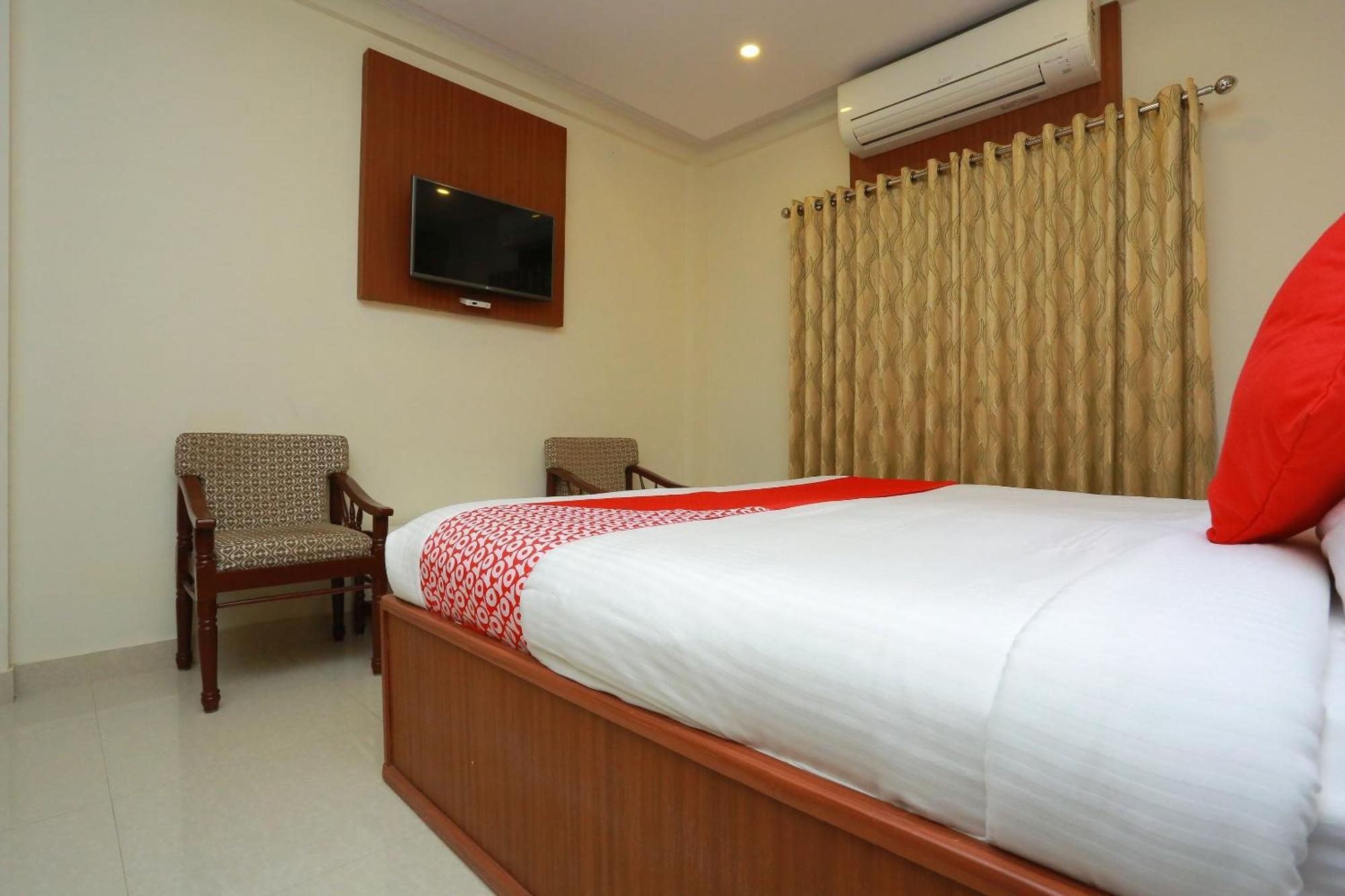 Capital O Kovilakam Residency Thrissur Экстерьер фото