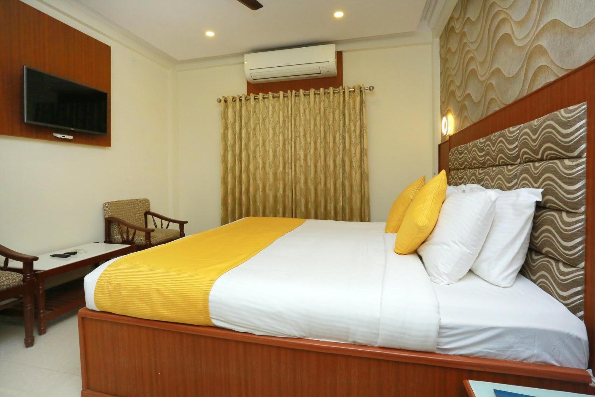 Capital O Kovilakam Residency Thrissur Экстерьер фото