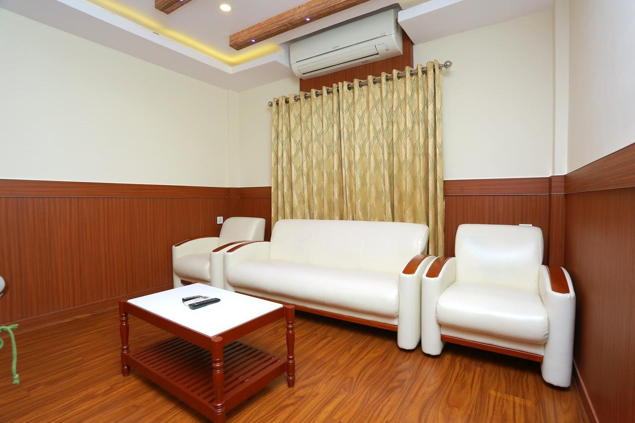 Capital O Kovilakam Residency Thrissur Экстерьер фото